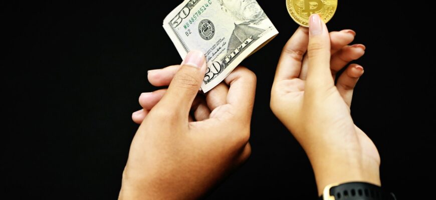 person holding 20 us dollar bill